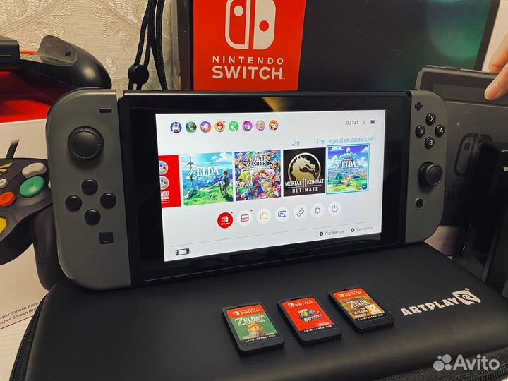 Nintendo Switch + геймпад Zelda + 3 игры + чехол