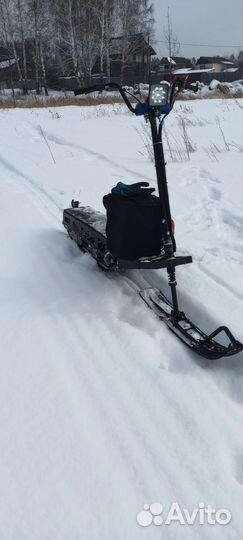 Мотосноуборд