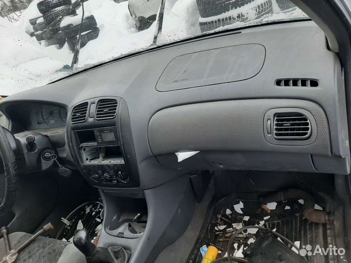 Торпедо Mazda 323 1999 универсал