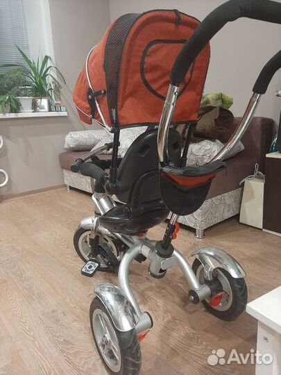 Велосипед-коляска с родительской ручкой