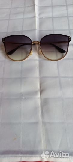 Солнцезащитные очки женские брендовые