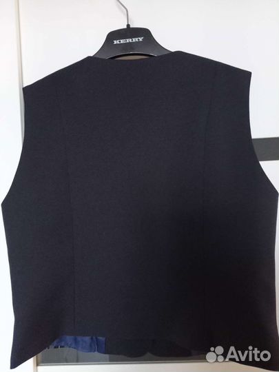 Жилет школьный в клетку для девочки