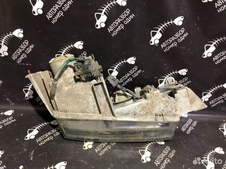 Фара передняя левая Mazda 626 GE