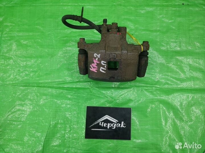 Суппорт передний правый Sportage / Tucson 04-10