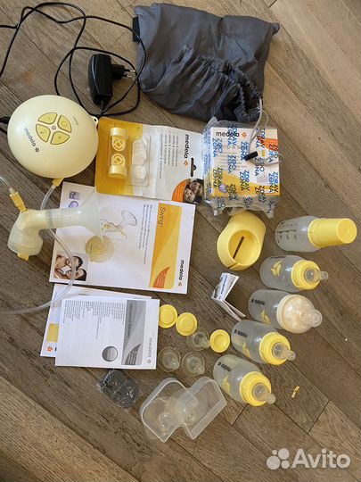 Молокоотсос medela электрический
