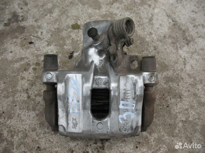 Суппорт задний правый Ford Focus 2