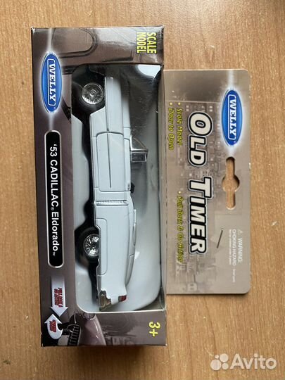 Машинуа welly cadillac