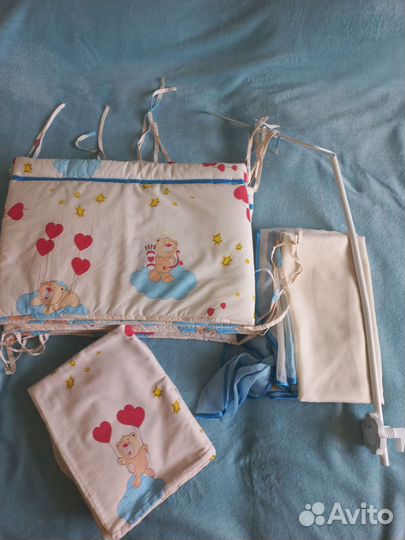 Детская кроватка с продольным маятником