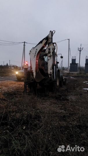 Экскаватор-погрузчик Terex TLB840, 2011