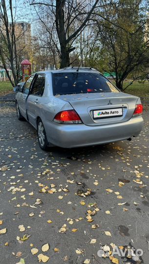 Mitsubishi Lancer 1.6 AT, 2009, 260 000 км