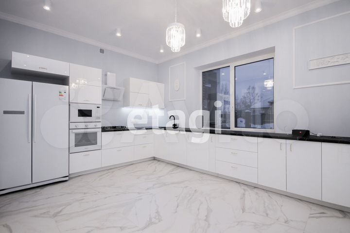 Дом 411,4 м² на участке 12 сот.