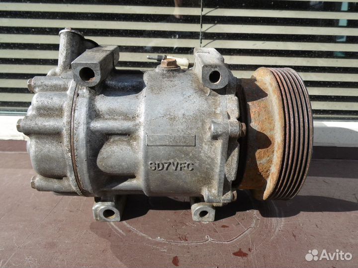 Компрессор кондиционера Рено Логан Сандеро