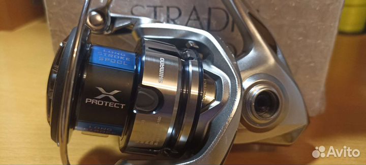 Катушка безынерционная shimano Stradic FL 1000