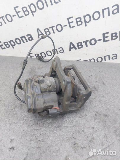 Суппорт с электроручником задний правый Land Rover