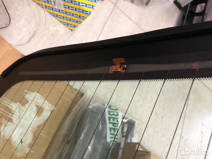 Стекло заднее Opel Astra J