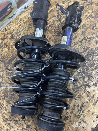 Стойки амортизаторы перед Опель Астра J