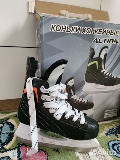 Коньки хоккейные action