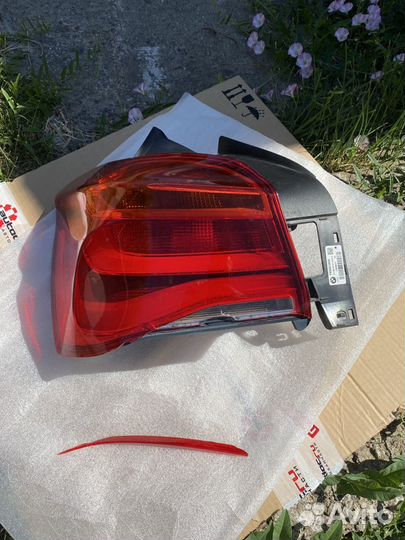 Фонарь задний левый BMW 63217359017 для BMW 1 сери