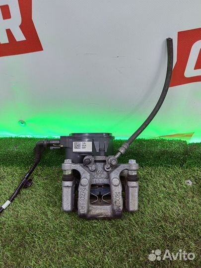 Суппорт тормозной задний левый Kia Sportage QL