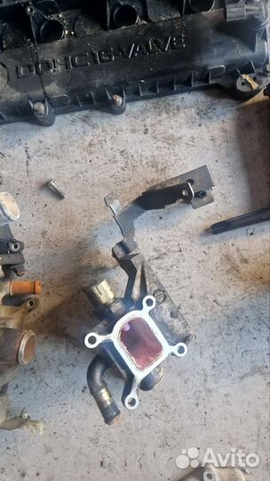 Флянец системы охлаждения мазда 3 бк спорт