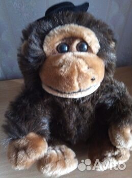 Деткая игрушка обезьяна на батарейках