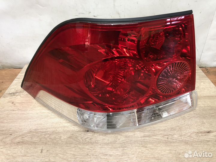 Левый фонарь Opel Astra h седан