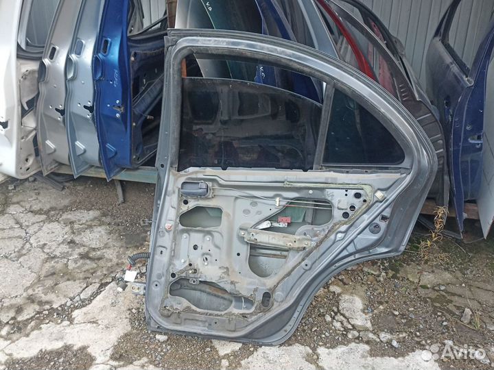 Дверь задняя правая Nissan Almera N16 седан