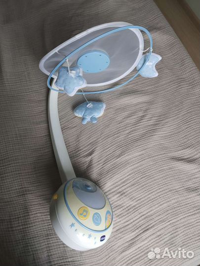 Мобиль на кроватку с проектором Chicco