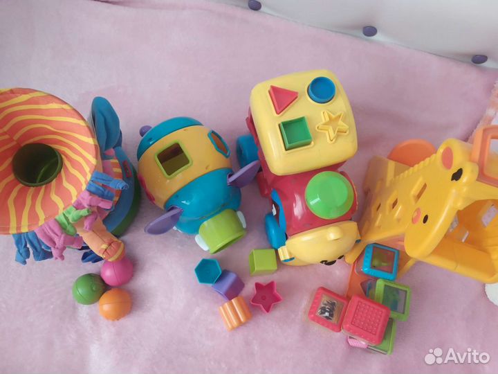 Фирменные развивающие игрушки