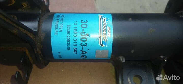 Стойка амортизатора Опель Корса D