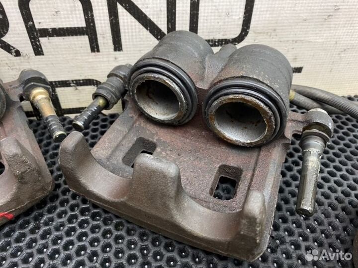 Суппорта передние Subaru Forester SG5 EJ203 2.0