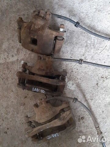 Суппорт передний Mitsubishi Lancer 10