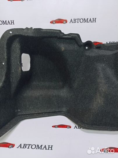 Обшивка багажника левая Toyota Corolla E150