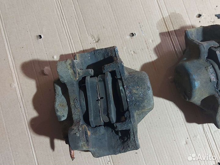 Суппорт задний правый; левый Опель; Вектра б