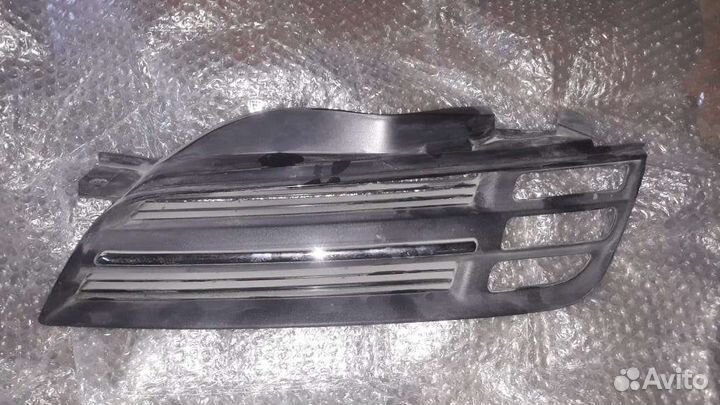 Решетка радиатора Nissan Micra, левая AK12 05-07