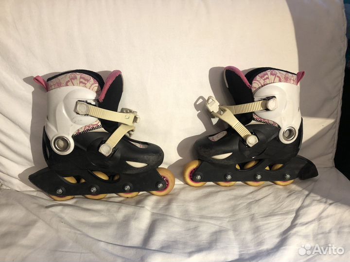 Роликовые коньки