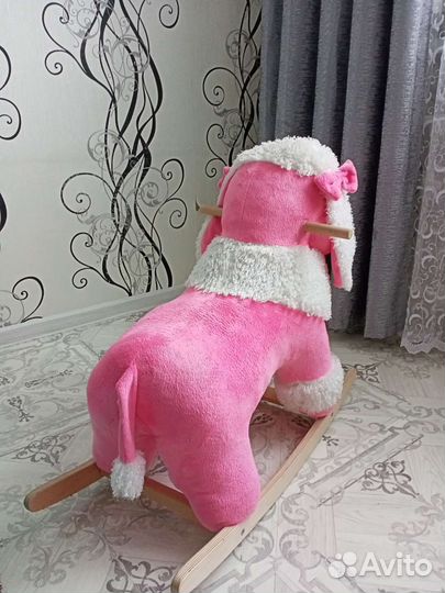 Собака качалка