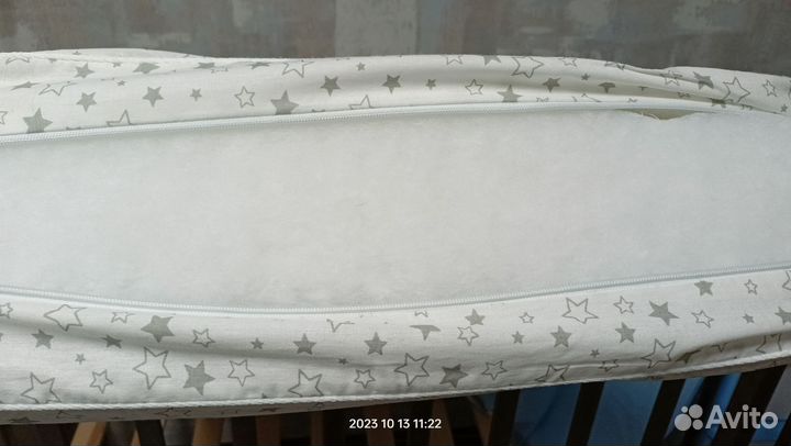 Детская кроватка с продольным маятником