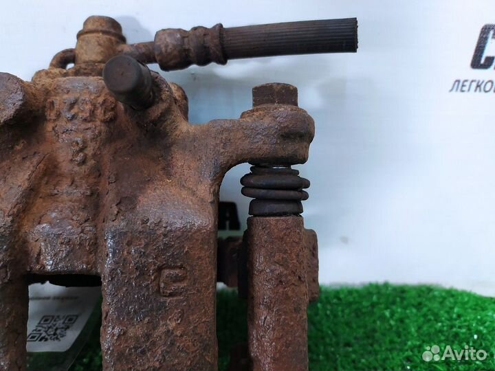 Суппорт тормозной задний правый R Nissan X-Trail