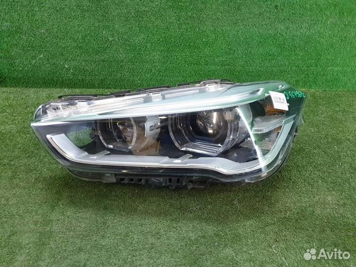 Фара левая BMW X1