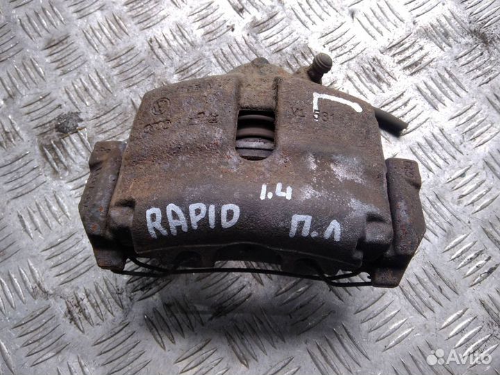 Суппорт передний левый VAG