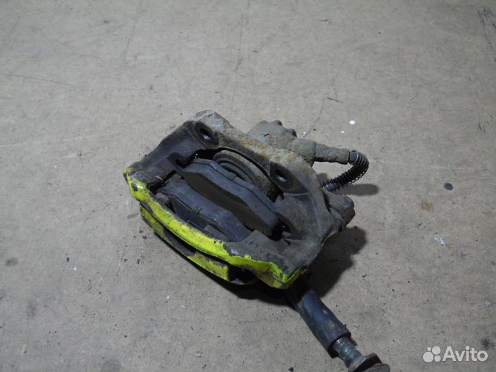 Суппорт передний правый Пежо 206