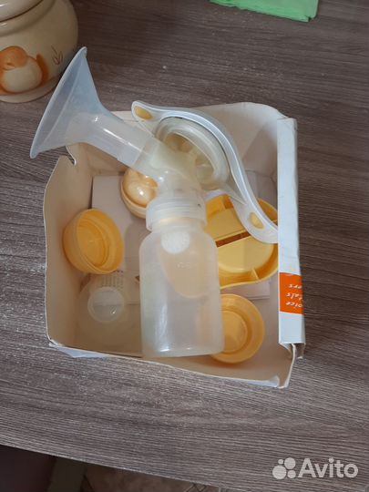 Молокоотсос medela