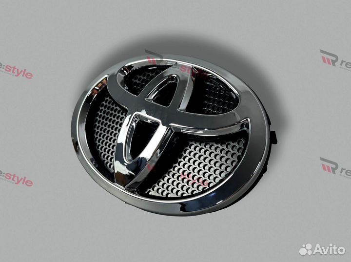 Эмблема в решетку Toyota Land Cruiser 200 с16г IXq