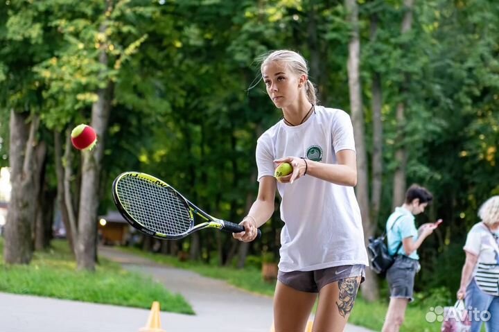 Тренер по большому теннису