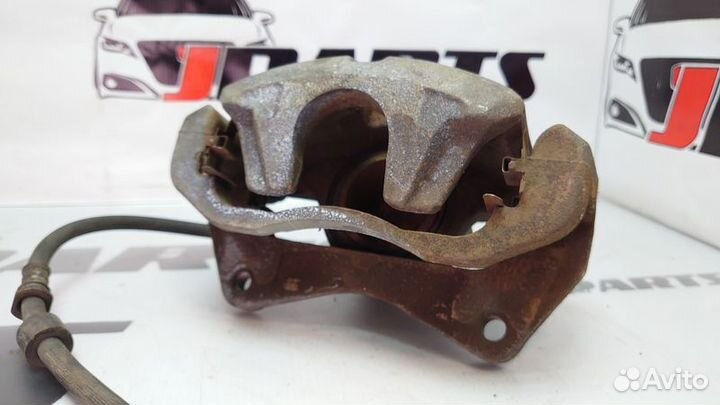 Суппорт тормозной передний Mitsubishi Lancer X (20