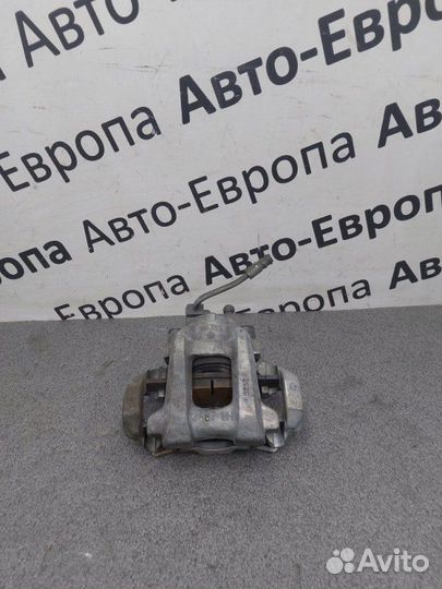 Суппорт задний левый Jeep Grand Cherokee WK2 3.0D