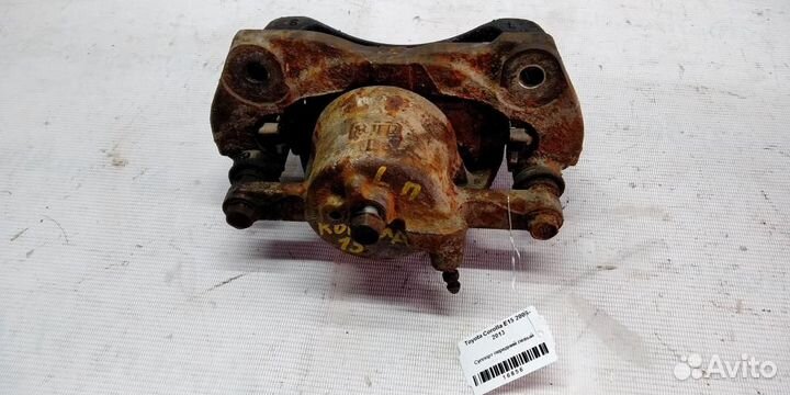 Суппорт передний левый Toyota Corolla E15