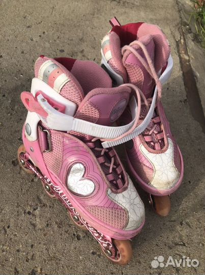 Роликовые коньки