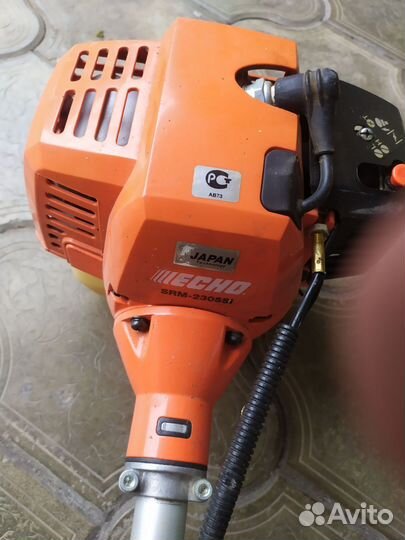 Бензокосилка